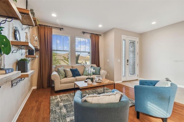 living room featuring hardwood / wood-style flooring and french doors