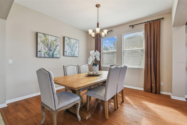 2212 Valterra Vista Way, Valrico, FL 33594 - dining space with a chandelier and light wood-type flooring