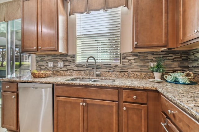 2212 Valterra Vista Way, Valrico, FL 33594 - kitchen featuring stainless steel dishwasher, backsplash, and brown cabinetry