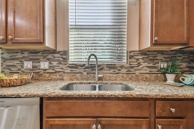 2212 Valterra Vista Way, Valrico, FL 33594 - kitchen featuring stainless steel dishwasher, backsplash, and light stone counters
