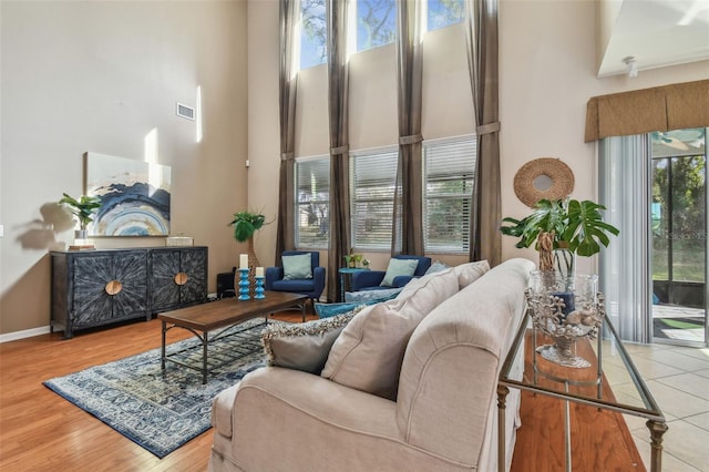 living room featuring hardwood / wood-style floors and a healthy amount of sunlight