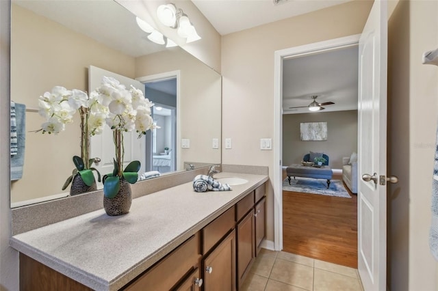 2212 Valterra Vista Way, Valrico, FL 33594 - bathroom with ensuite bathroom, vanity, tile patterned flooring, and ceiling fan