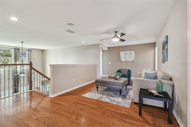 sitting room featuring hardwood / wood-style flooring and ceiling fan