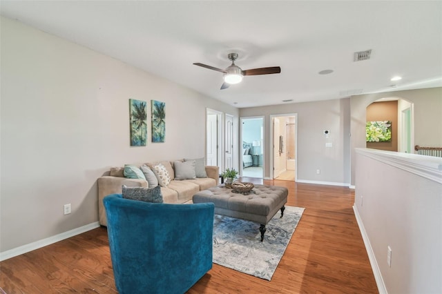 2212 Valterra Vista Way, Valrico, FL 33594 - living area with a ceiling fan, arched walkways, wood finished floors, and recessed lighting