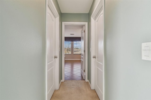 2212 Valterra Vista Way, Valrico, FL 33594 - hall featuring light tile patterned flooring and light carpet