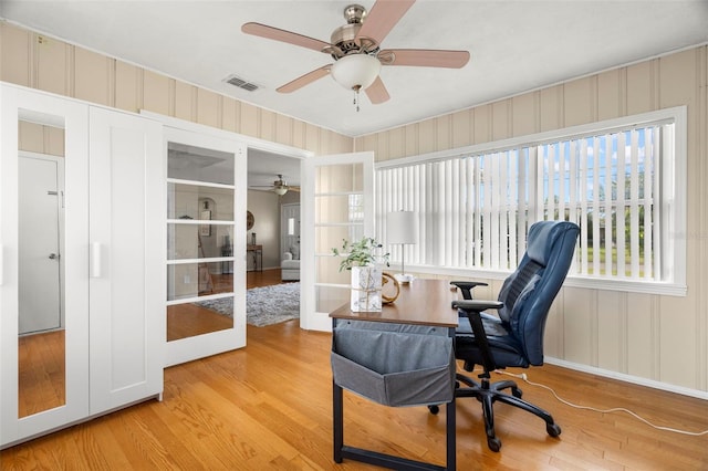 office area featuring hardwood / wood-style floors and french doors