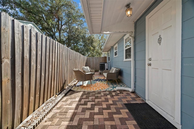 view of patio with cooling unit