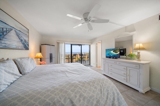 tiled bedroom with access to exterior and ceiling fan