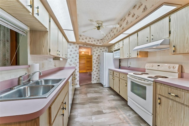 kitchen featuring light brown cabinets, white appliances, sink, ceiling fan, and tasteful backsplash