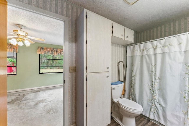 bathroom featuring ceiling fan, hardwood / wood-style floors, a textured ceiling, and toilet