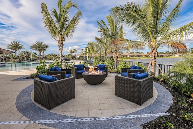 11726 Renaissance Blvd, Venice, FL 34293 - view of patio / terrace with a fire pit and an outdoor pool
