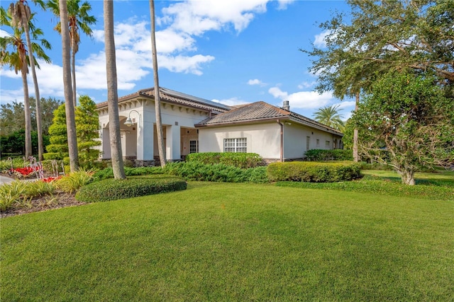 view of front of house with a front lawn