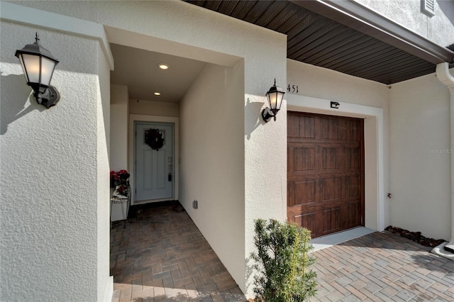 property entrance featuring a garage