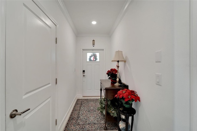 entryway featuring crown molding