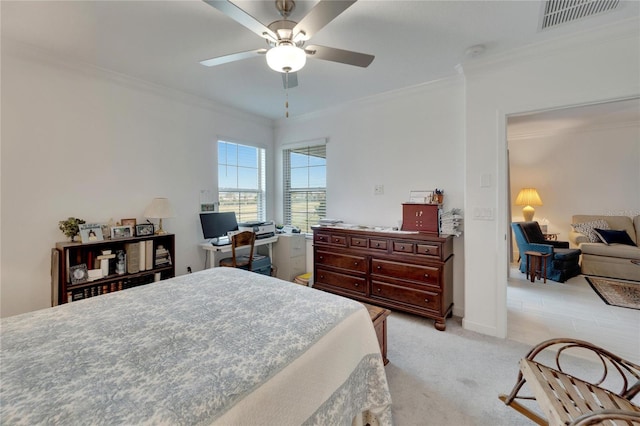 bedroom featuring light colored carpet, ceiling fan, and crown molding