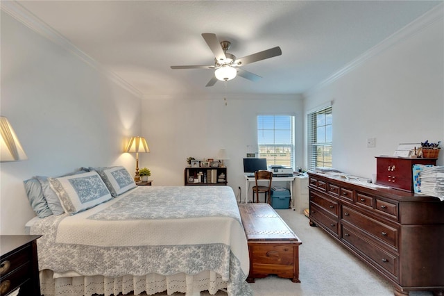 bedroom with light carpet, ceiling fan, and ornamental molding