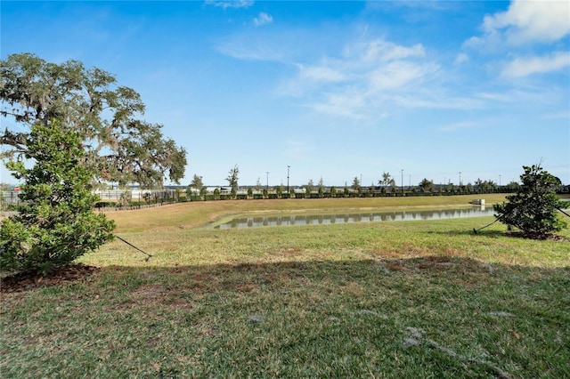 view of yard with a water view