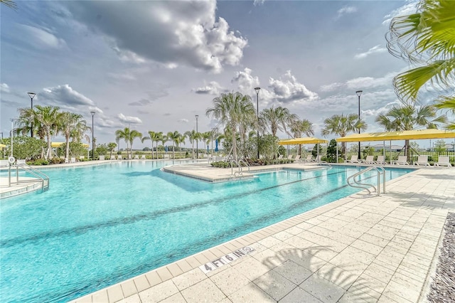 view of swimming pool featuring a patio