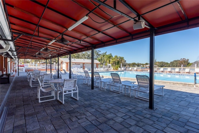 view of patio featuring a community pool