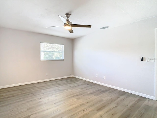 unfurnished room featuring wood-type flooring and ceiling fan