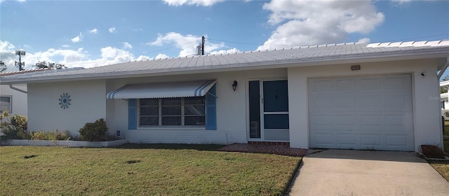 ranch-style home featuring stucco siding, a front lawn, concrete driveway, and brick siding