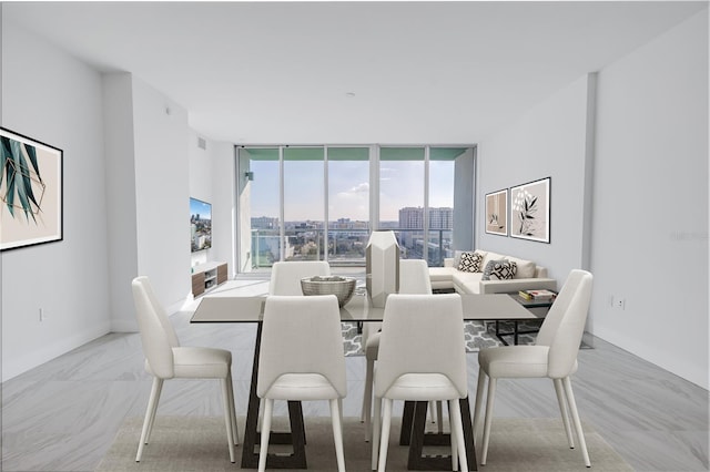 dining area with floor to ceiling windows