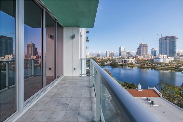 balcony featuring a water view