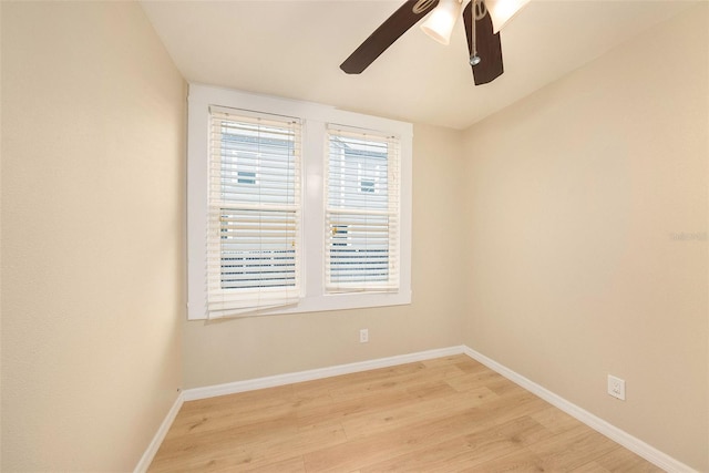 empty room featuring ceiling fan and light hardwood / wood-style flooring