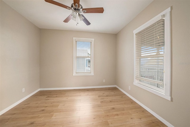 unfurnished room featuring ceiling fan and light hardwood / wood-style flooring