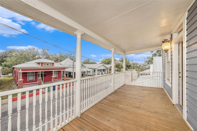 wooden deck featuring covered porch