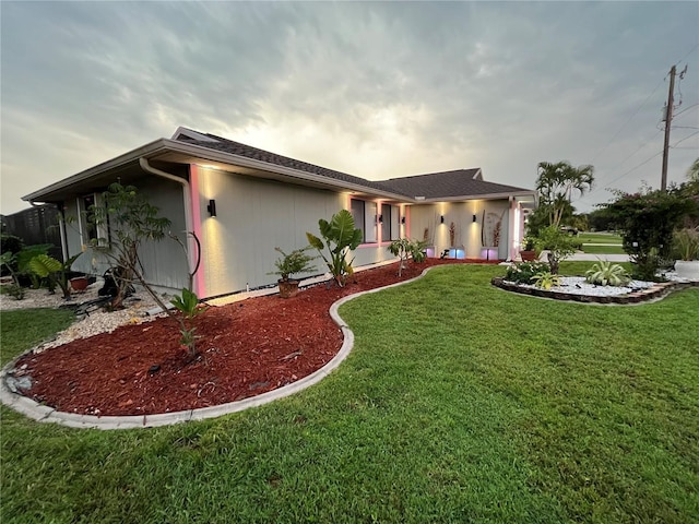 view of front of house with a front lawn