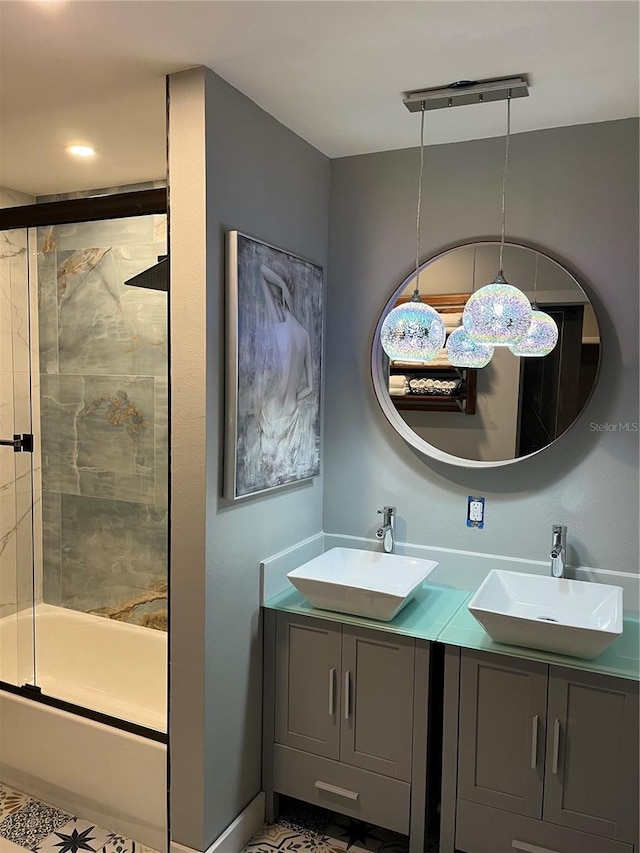 bathroom featuring vanity and enclosed tub / shower combo