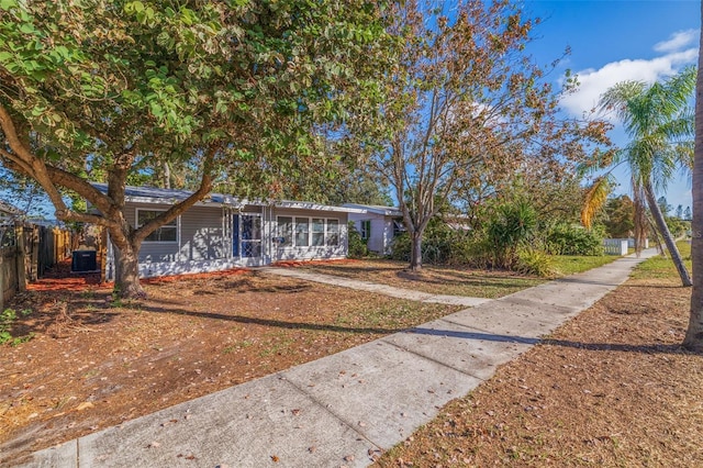 ranch-style home featuring central air condition unit