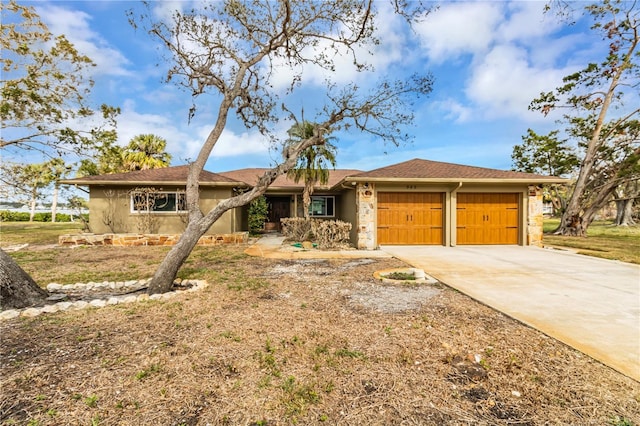 single story home with a garage