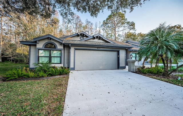 ranch-style home with a garage