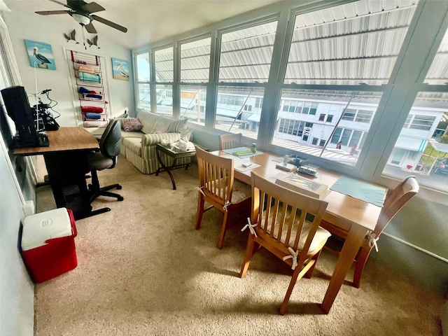 interior space featuring ceiling fan