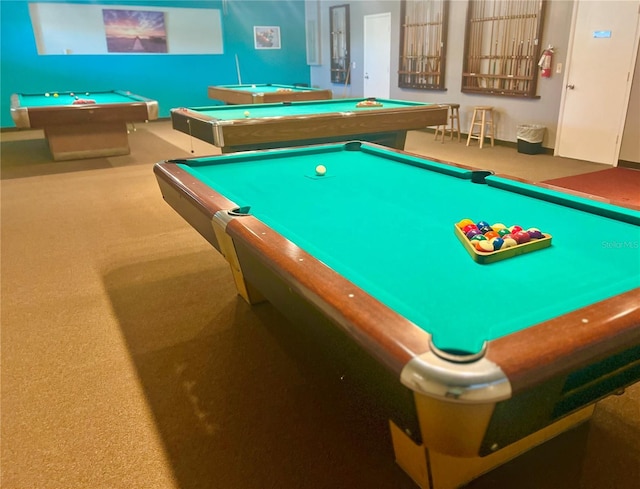 game room with pool table and carpet flooring