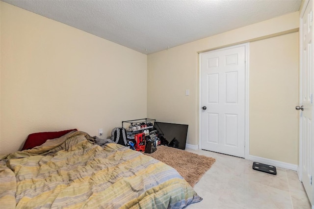 bedroom with a textured ceiling