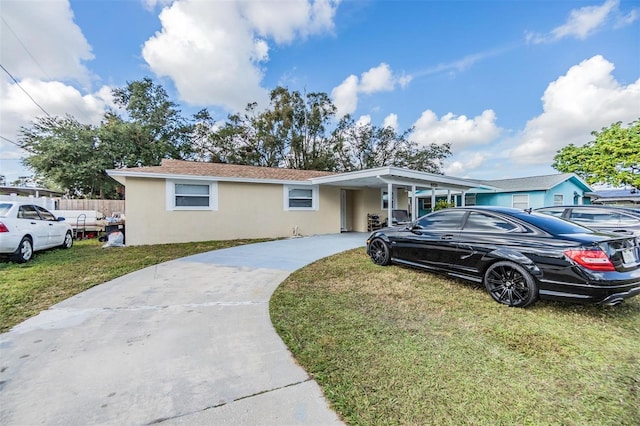 ranch-style house with a front lawn