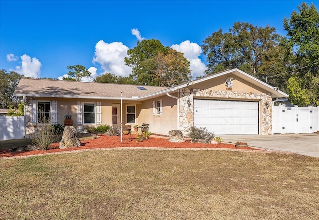 ranch-style house with a garage and a front yard