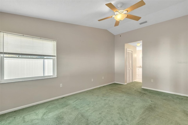 unfurnished room with carpet, ceiling fan, and lofted ceiling