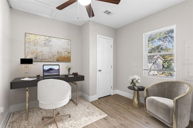 office with ceiling fan and light wood-type flooring