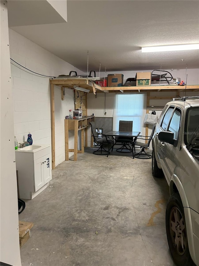 garage with a workshop area