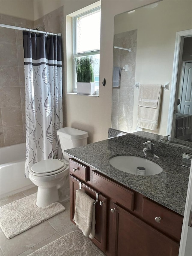 full bathroom with toilet, tile patterned floors, vanity, and shower / tub combo