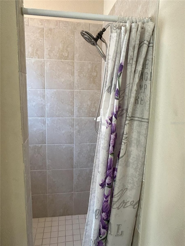 bathroom with a shower with shower curtain