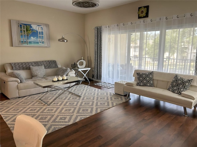 living room featuring dark hardwood / wood-style flooring