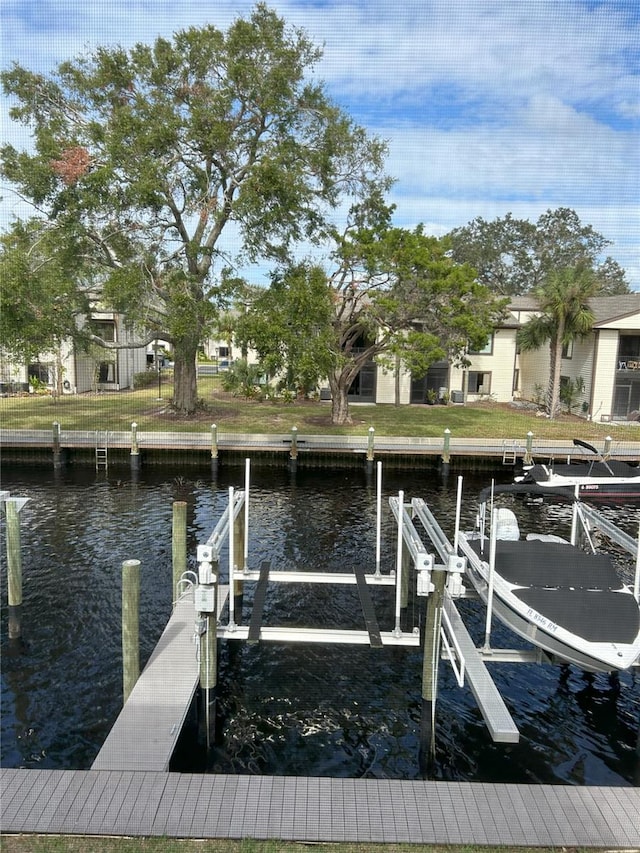 dock area featuring a water view