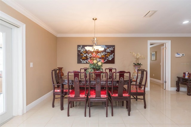 dining area with light tile patterned flooring, crown molding, and an inviting chandelier