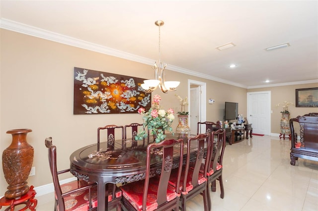 dining room featuring crown molding, light tile patterned floors, and an inviting chandelier