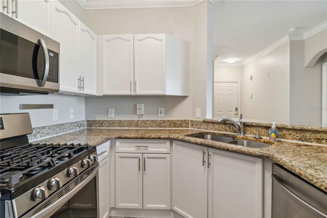 kitchen with stone counters, sink, stainless steel appliances, white cabinets, and ornamental molding